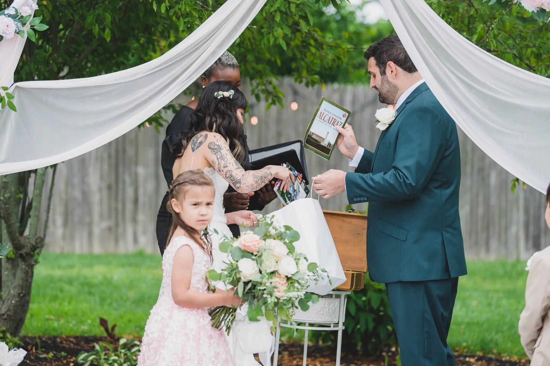 A couple sealing a time-capsule unity ritual during their ceremony